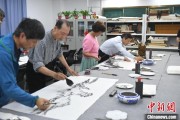 农历大全两岸艺术家在安徽“共绘一幅画”